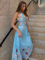 Tiefblaues 50er Kleid mit Sonnenblumen-Print und Neckholder