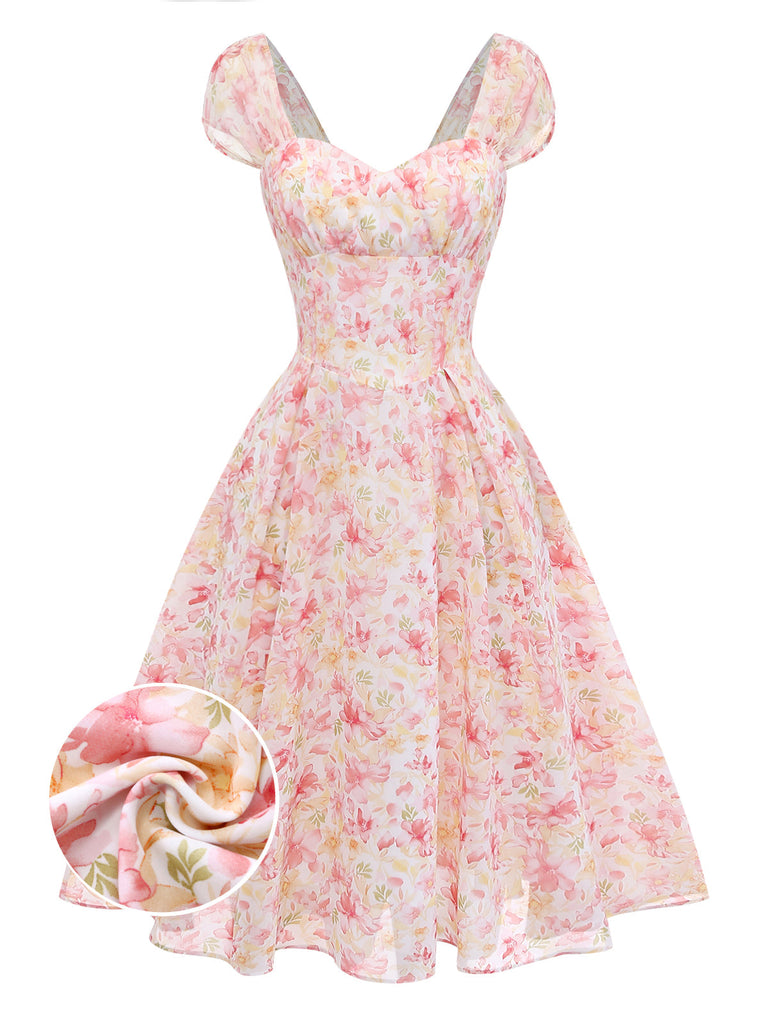 [Vorverkauf] Rosa Chiffonkleid mit Blumenmuster und Schleife im Stil der 1950er Jahre