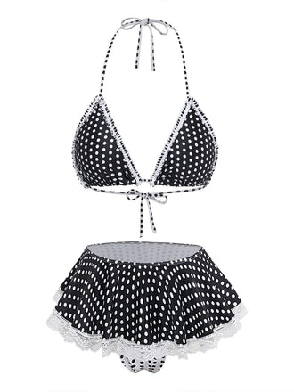 Schwarz-weiß gepunktetes Bikini-Set mit Spitzendetails auf weißem Hintergrund