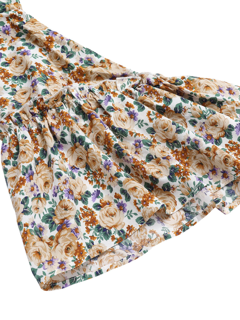 1960er Ausgestelltes Kleid mit langen Ärmeln und Gürtel mit Blumenmuster