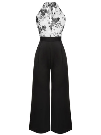 SCHWARZER WEISSER BLUMEN JUMPSUIT MIT HALFTERRIEMEN