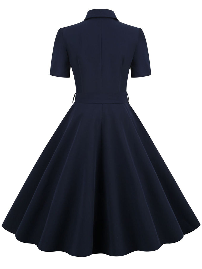 MARINEBLAUES SWING-KLEID MIT EINFARBIGEM GÜRTEL