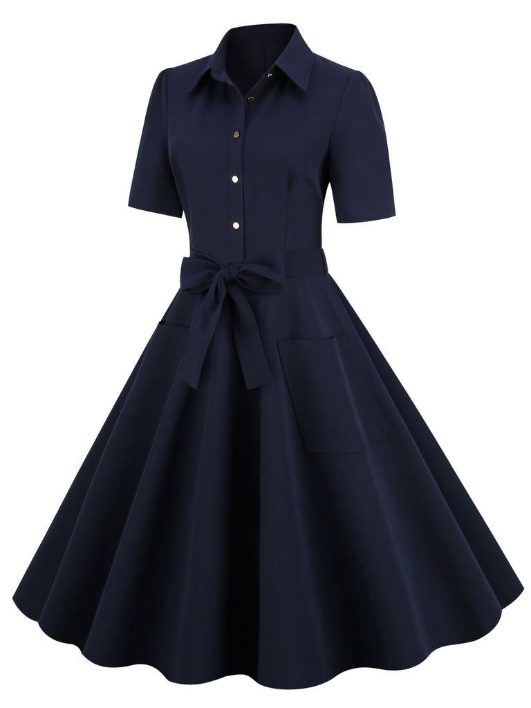 MARINEBLAUES SWING-KLEID MIT EINFARBIGEM GÜRTEL